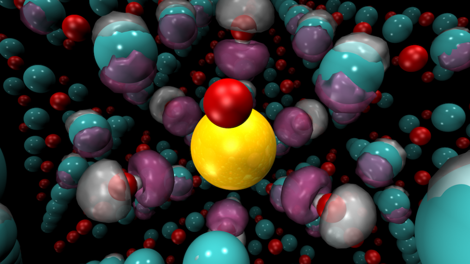 Diffusion Monte Carlo spin density difference between bulks of potassium-doped nickel oxide and pure nickel oxide, showing the effects of substituting a potassium atom (center atom) for a nickel atom on the spin density of the bulk.