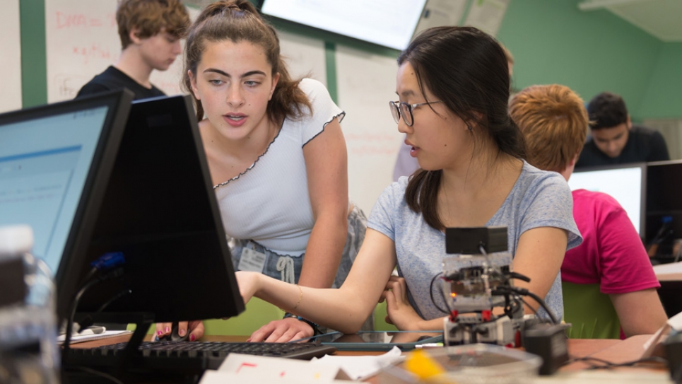 Students practice new skills taught in the 2017 coding camp. Participants explored how Argonne scientists use computers in diverse disciplines and were introduced to up-to-date programming tools. (Image by Argonne National Laboratory.)